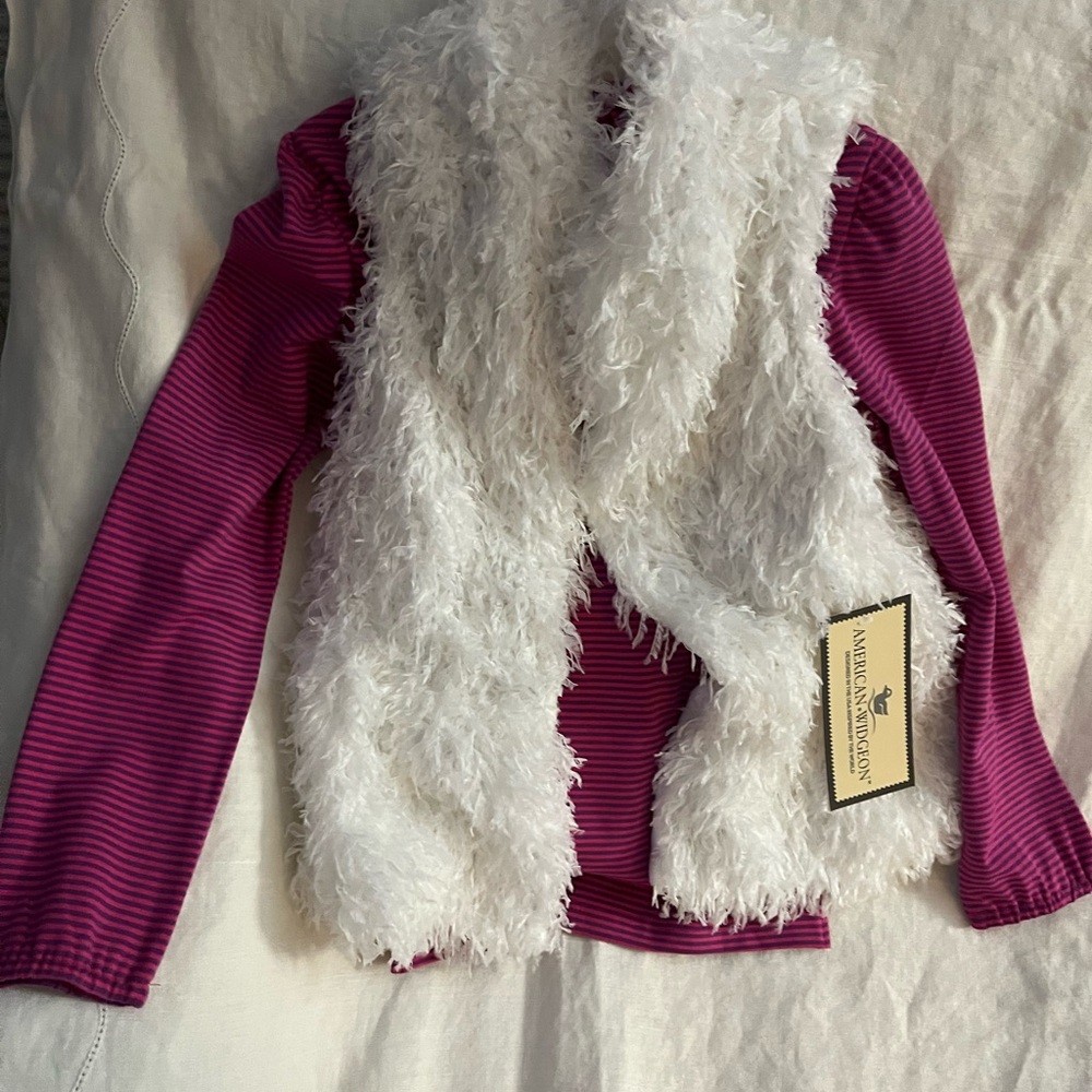 Girls peplum vest size 6x great piece for fall.  Never worn, nwt.  Snow color.